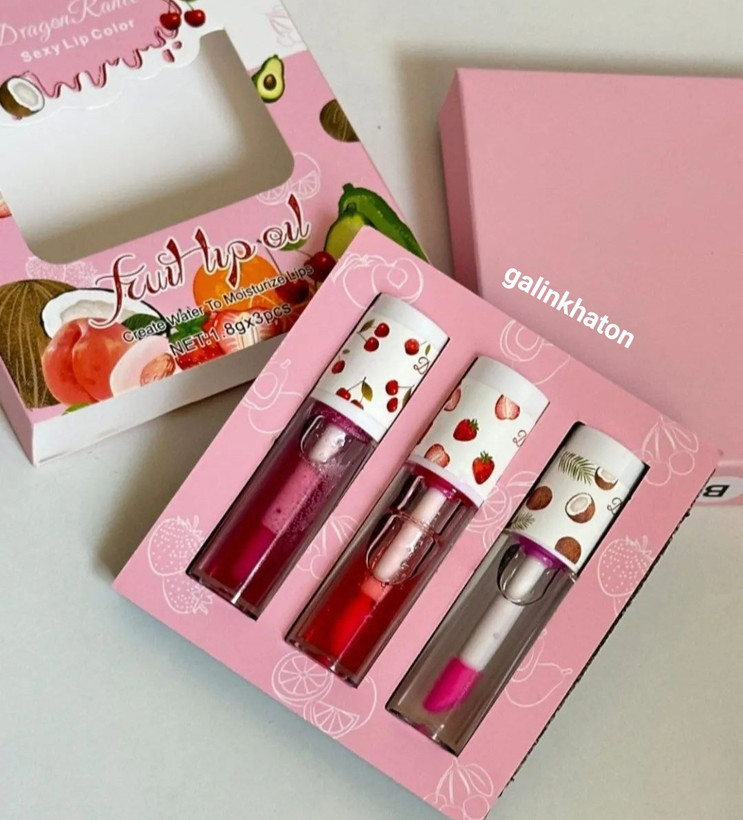 نمای نزدیک لیپ اویل برند Dragon با جزئیات طراحی فانتزی و کیفیت بالا، مناسب لبهای خشک و بیرنگ.