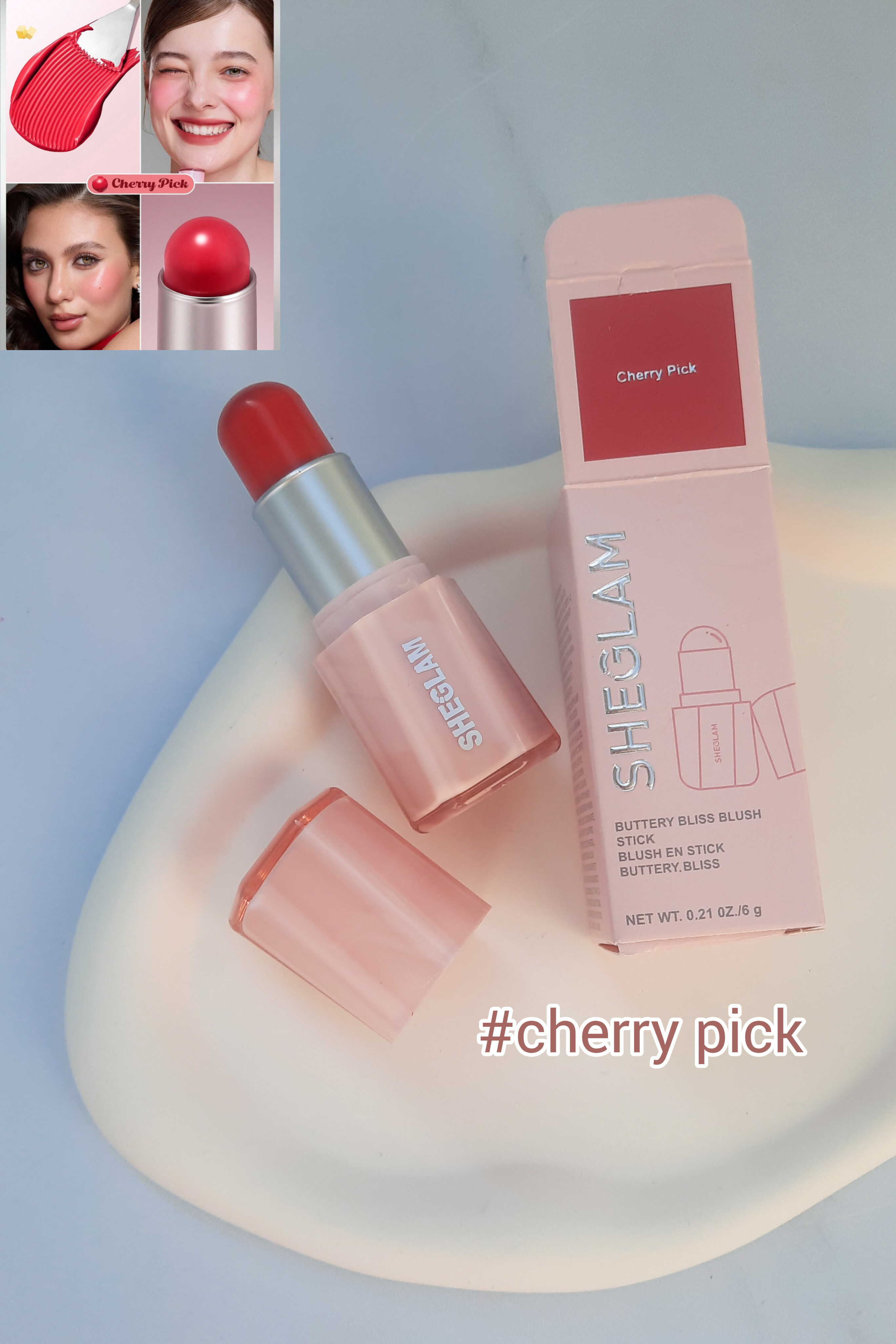 رژگونه کره‌ای Sheglam درب‌باز کنار جعبه با تست رنگ ژورنالی روی پس‌زمینه سنگی سفید